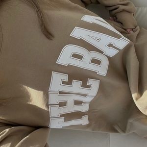 The bar beige varsity crew neck